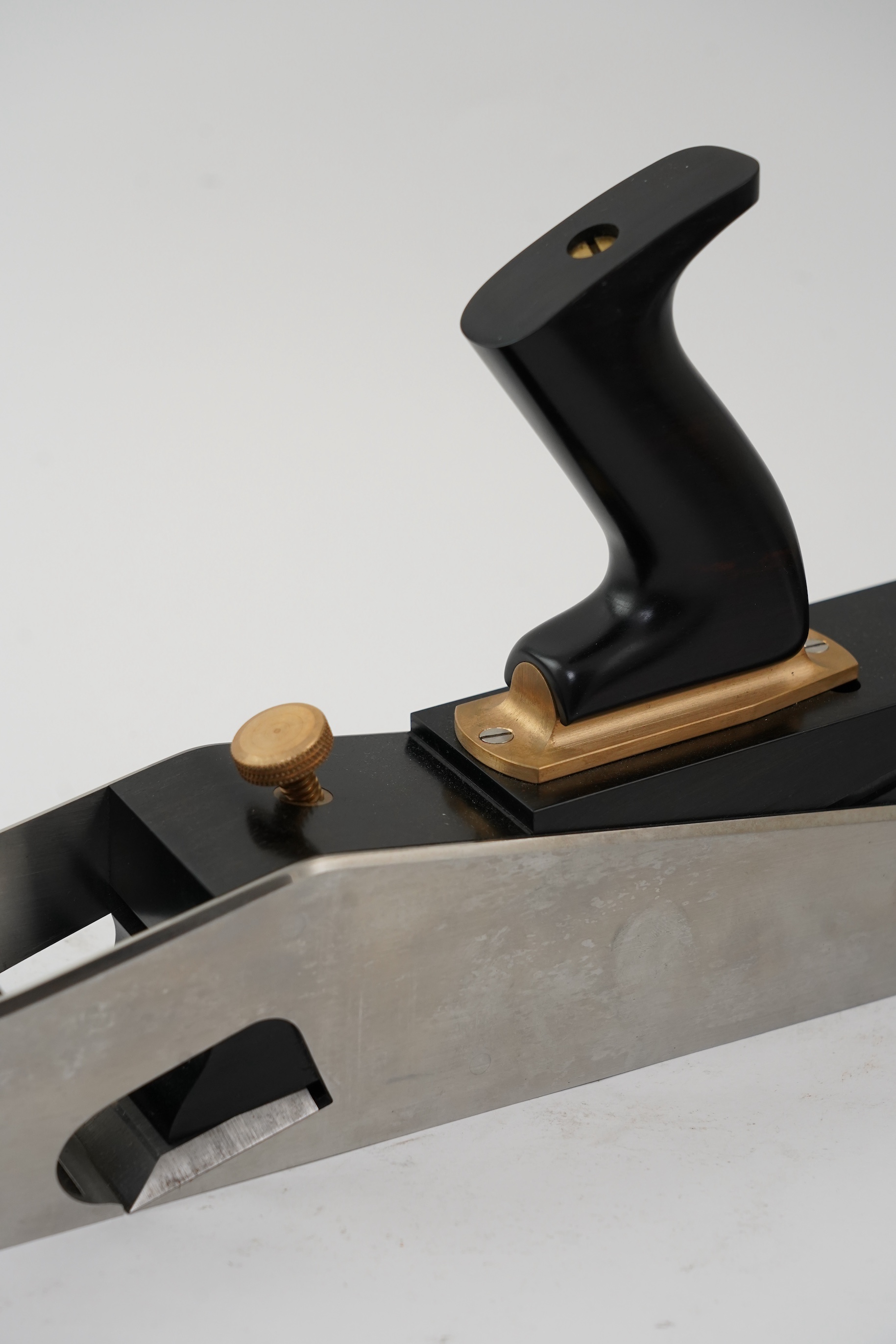 A very fine modern rebate mitre plane by Sauer & Steiner Toolworks, Ontario, handmade in the style of a Norris rebate mitre plane, with ebony infill, handle and wedge, adjustable iron, the handle on an adjustable lateral